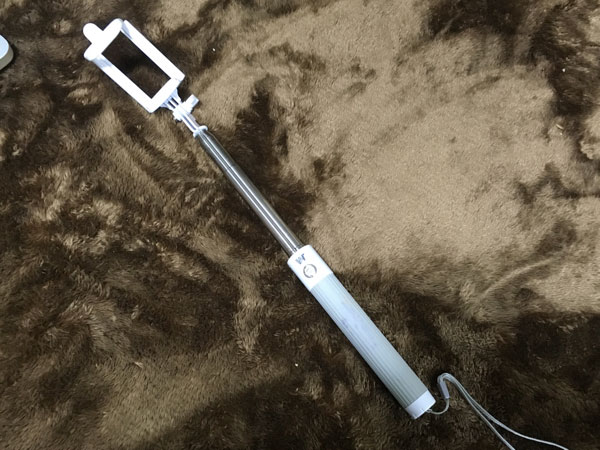 A selfie stick I bought on a trip that has never been actually used. This thin, unreliable stick...
